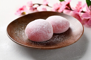 japanische Mochi rosa mit Kirschblüten, Hanami