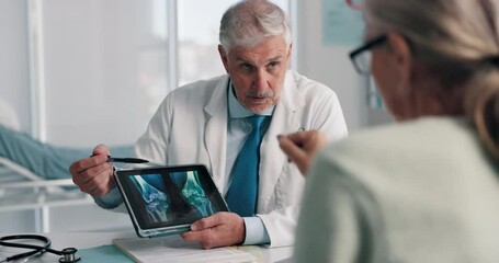 Doctor, senior woman and tablet for x ray with review for broken bones, osteoporosis or knee pain. People, touchscreen and medical consulting for arthritis, feedback and report for wellness at clinic - Powered by Adobe