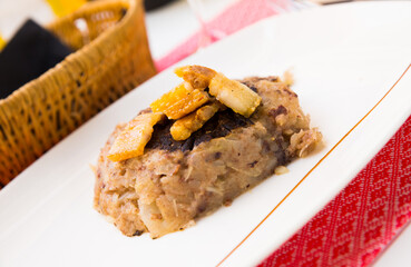 Delicious potato and cabbage hash with fried bacon (Trinxat de la Cerdanya). Traditional Catalan dish..