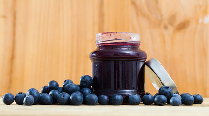 Tasty dessert - canned whortleberry jam and fresh berries