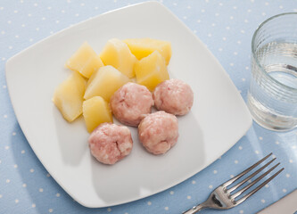 Close up of cooked on steam meatballs, served with potatoes, diet food