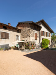 Connected holiday homes, Italian style with a large front yard and bicycles parked.