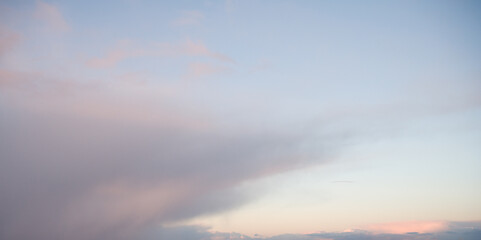 Soft Pastel Sky with Clouds