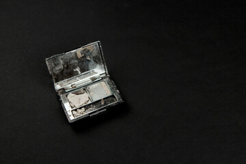 Broken powder in an open package