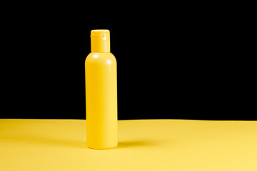 Yellow bottle in minimalist style