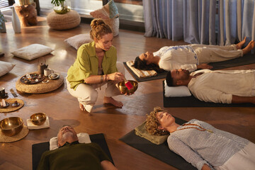 Sound healing session with tibetan bowl