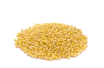 Heap of millet isolated on white background.