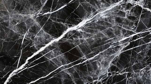Cool grey marble with fine white lines flowing diagonally across the surface