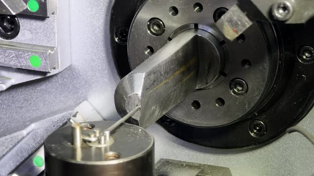 Wire bending machine demonstrates precision in metal fabrication at a manufacturing facility