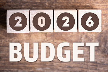 Budget 2026 new year on wooden blocks and office business concept background. 2026 Budget planning and allocation concept concept. 2026 New year resolutions, goals