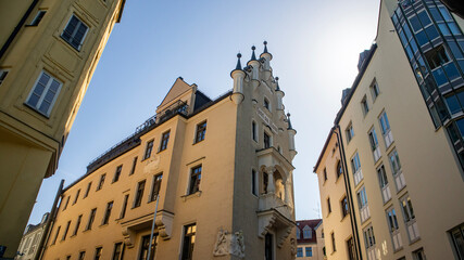 A historic building in an urban setting with a bright sky, Munich, Bavaria, Germany