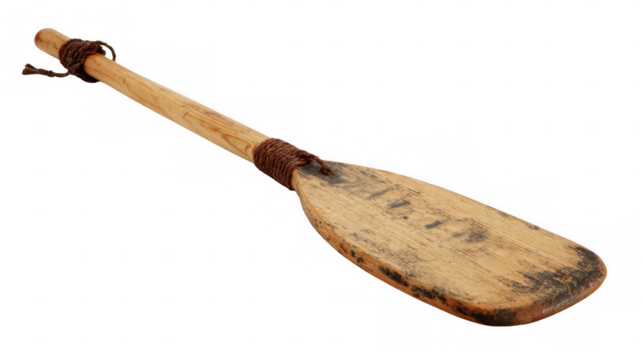 Wooden paddle with worn handle and transparent background leaning next to canoe, showing signs of wear and tear, suggesting its history and use in water activities