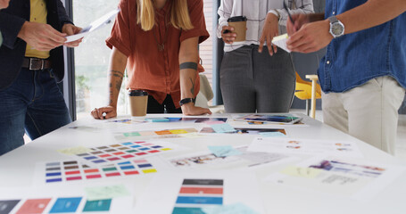 Color swatch, hands or people in meeting for planning, brand choice or approval decision. Teamwork, review or creative project manager with group, tablet or designers for company identity or task