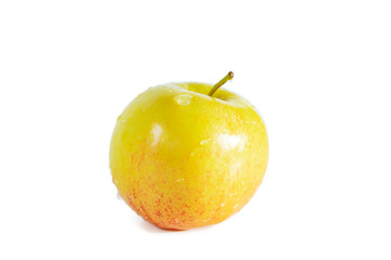 Shiny juicy yellow apple isolated on white background.