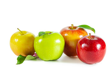 Shiny juicy multi-colored apples with leaves isolated on white background.