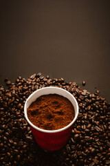 Close-up of roasted brown coffee beans falling against white background, showcasing texture, aroma, freshness, and energy for a morning brew.
