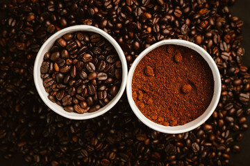 Close-up of roasted brown coffee beans falling against white background, showcasing texture, aroma, freshness, and energy for a morning brew.