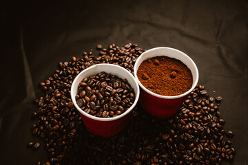 Close-up of roasted brown coffee beans falling against white background, showcasing texture, aroma, freshness, and energy for a morning brew.