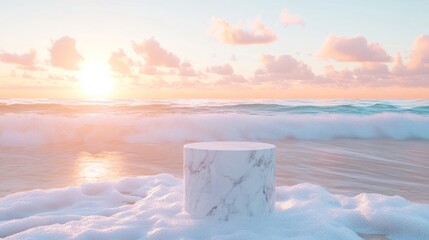 Marble pedestal on a beach at sunrise.