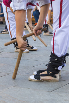 Ball de bastons dancers performing traditional catalan dance with sticks