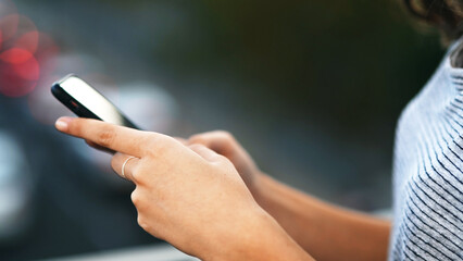 Hands, woman and typing with phone in city for direction search, online ride booking and travel app. Connection, person and smartphone outdoor for social networking, destination map and communication