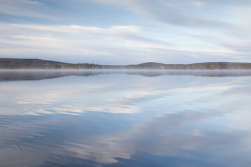 Fototapeta premium Autumnal lake scenery in Sweden during sunset