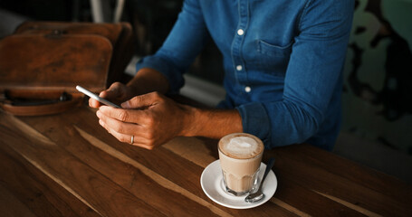 Cafe, coffee and hands with smartphone for review, online communication and scroll on social media. Restaurant, person and espresso cup with mobile for application, message and survey in closeup