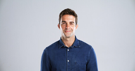 Denim, fashion and man in portrait with confidence, mockup space or white background. Male model,...
