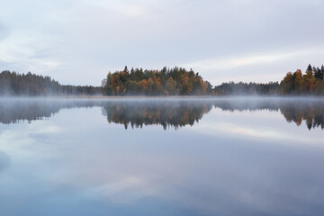 Fototapeta premium Autumnal lake scenery in Sweden during sunset