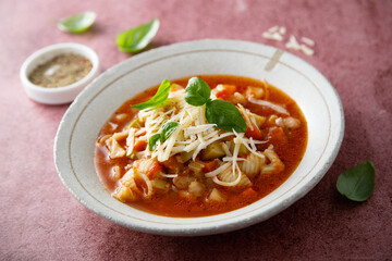 Traditional minestrone soup with cheese