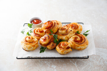 Puff pastry swirls with ham and cheese