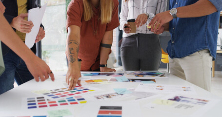 Color swatch, hands or people with teamwork for planning, brand choice or approval decision. Meeting, review or creative project manager with group, tablet or designers for company identity or task