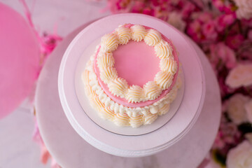 Pink decor with flowers for first birthday