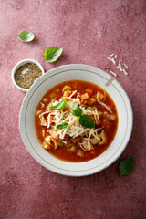 Traditional minestrone soup with cheese