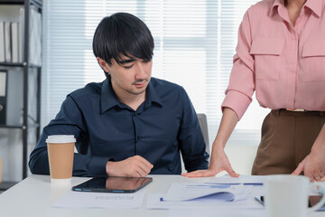 A diverse team of innovative business professionals gathers around a table in a sleek, modern office environment for a high-level brainstorming session focused on agile development strategies 