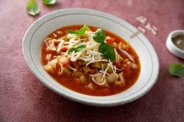 Traditional minestrone soup with cheese