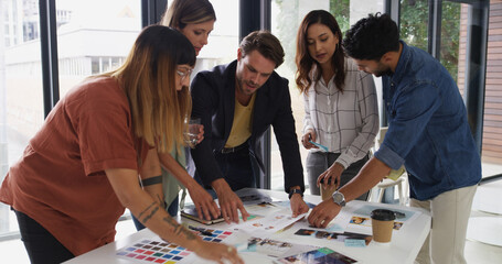 Office, business people and teamwork with planning for color swatch, creative agency or talking. Boardroom, women or men as graphic designer with palette for brainstorming, company branding or choice