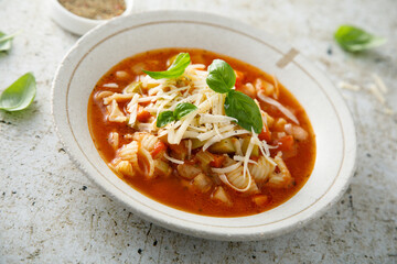 Traditional minestrone soup with cheese
