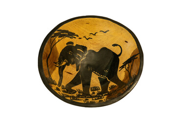 A traditional African hand-carved wooden bowl with a painted elephant isolated against a white background
