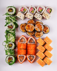 A Delicious and Colorful Assortment of Various Sushi Rolls and
