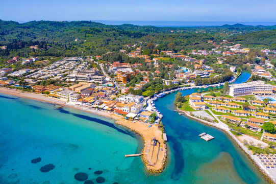 Messonghi Beach holiday resort over canal separating Moraitika and Messonghi villages on a Corfu Island, Greece