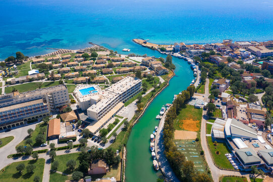 Messonghi Beach holiday resort over canal separating Moraitika and Messonghi villages on a Corfu Island, Greece