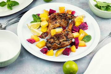 Duck legs with fruits.