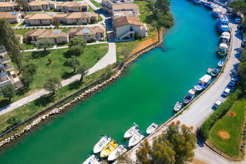 Messonghi Beach holiday resort over canal separating Moraitika and Messonghi villages on a Corfu Island, Greece