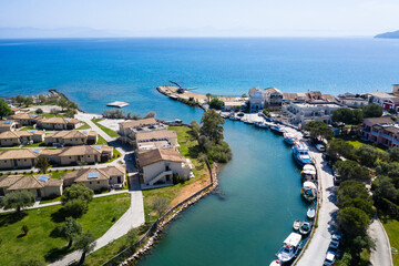 Messonghi Beach holiday resort over canal separating Moraitika and Messonghi villages on a Corfu Island, Greece