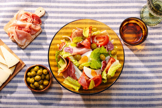 Catalan salad with Spanish ham and olives