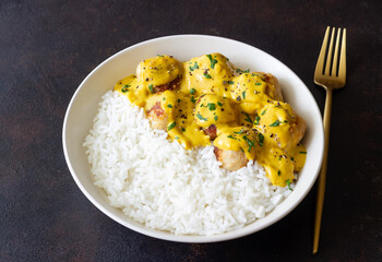 Meatballs in curry sauce with rice. Healthy food. Recipe.
