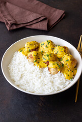 Meatballs in curry sauce with rice. Healthy food. Recipe.