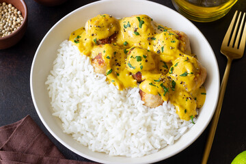 Meatballs in curry sauce with rice. Healthy food. Recipe.