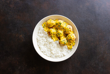 Meatballs in curry sauce with rice. Healthy food. Recipe.